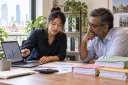 An accountant explains service levels to a client using their actual transaction volumes.