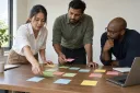 A small-business team arranges improvement options by urgency and readiness.