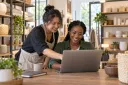A shop owner and employee consolidate business information into one reliable website.